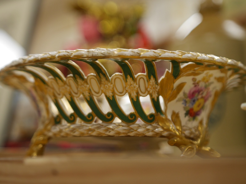 A mid 19th century English porcelain basket and a similar dish, 32cm. Condition - area of restoration to basket